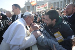 Pope and disabled man